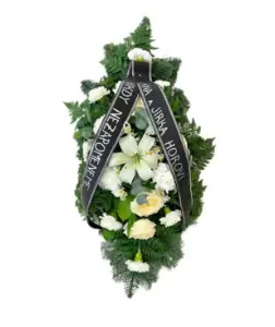 Vypichovaná smuteční kytice z bílých lilií a karafiátů